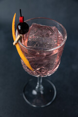 the bartender prepares a delicious alcoholic cocktail	