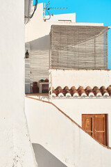 White rural house in summer in a Spanish town