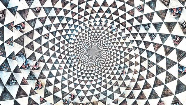 Seamless animation of a black and white mandala pattern swirl. Geometric graphic spiral with a psychedelic look.