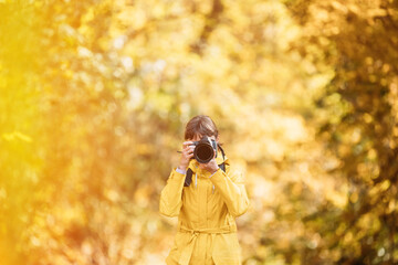 Lady Photographed Nature. Tourist Woman Walking And Taking Photos In Forest. Young Pretty Caucasian Happy Smiling Girl Woman On Road In Autumn Forest. Fun Enjoy Outdoor Autumn Nature.