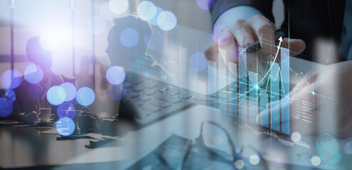Businessman working with modern computer calculator virtual dashboard analyzing finance sales data and economic growth graph chart and  account report technology.