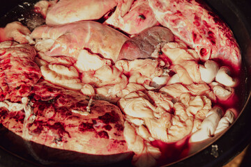 Fresh meat on display in a traditional market