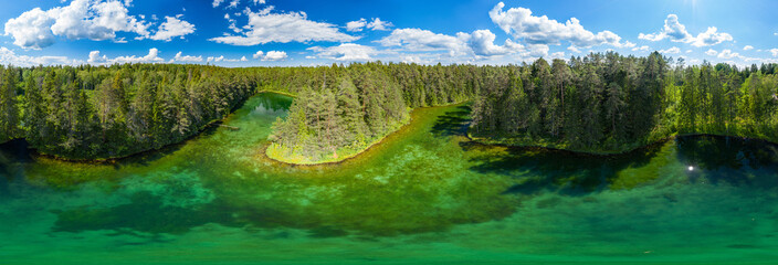 Antu blue springs lake, Estonia, Europe. Artesian well, clean drinking groundwater erupting out of...