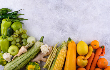 Assortment of yellow and red vegetables and fruits
