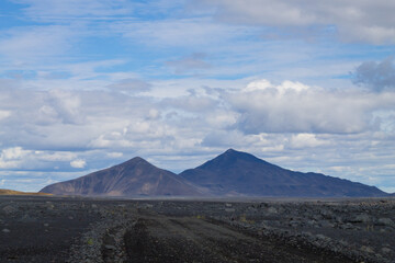 Fototapeta premium Dirt road along central highlands of Iceland.