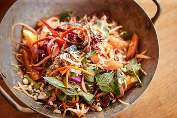 stir fried noodles with thai spicy salad