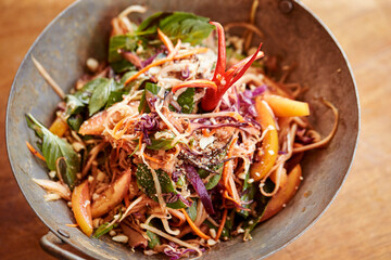 stir fried noodles with thai spicy salad