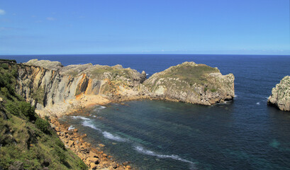 Fototapeta na wymiar Coastal part of Cantabria in the north of Spain, eroded Costa Quebrada, ie the Broken Coast