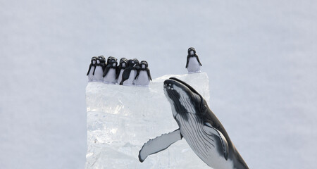 toys penguins on an ice floe © serikbaib