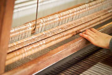 Close-up of fabric woven on a loom, Vietnamese traditional culture