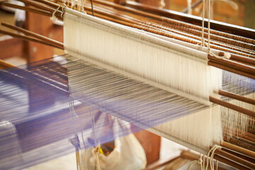 Close-up of fabric woven on a loom, Vietnamese traditional culture