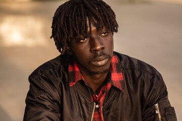 The Urban Rasta: A Portrait of a Young African Model with Natural Dreadlocks