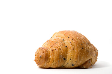 Close-up Of Poppy Seeds and Butter Croissant Isolated on White