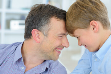 a father and son at home