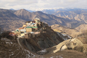 The bright and colorful village of Chokh against the backdrop of a mountain panorama in the Gunibsky district of Dagestan.