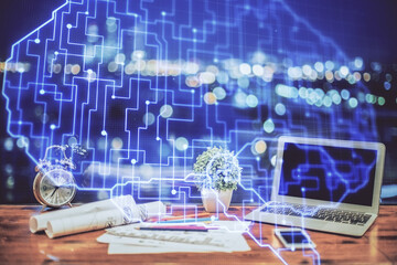 Double exposure of desktop with computer and brain drawing hologram. Artificial intelligence concept.