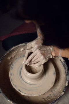 Closeup Of Potter's Hands Making Clay Water Pot On Pottery Wheel. Clay Pots Are Used Since Ancient Times And Can Be Found In Indian Subcontinent.