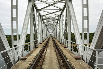 Railway bridge across the river and single-track railway
