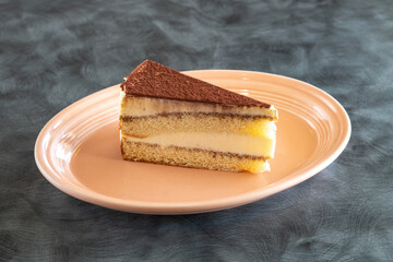 Slice of tiramisu on a plate