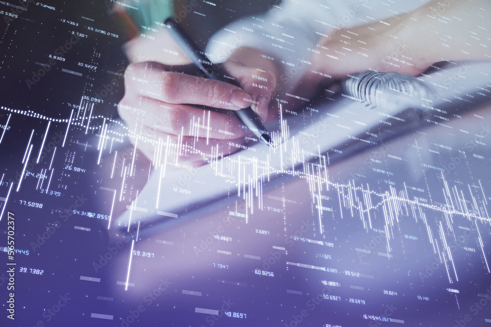 Poster financial forex graph displayed on hands taking notes background. concept of research. double exposu