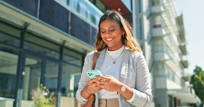 Black woman, phone and smile with city travel of a business employee texting outdoor. Happy, urban and social media app scroll of a young female professional walking with a mobile by a building