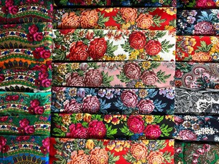 Folk style wool scarves with floral patterns.