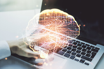 Double exposure of creative human brain microcircuit with hand typing on computer keyboard on background. Future technology and AI concept