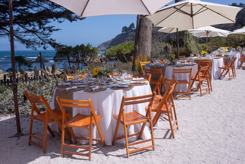 table and chairs on the beach