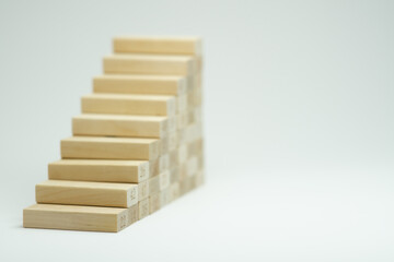 Male man hand climbing stairs on white background, concept for growth in life. Career ladder. Professional development, aims achievement, path to prosperity, hand simulate people climbing up stairs