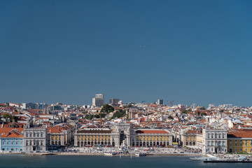 Fototapeta na wymiar Lisbon, Portugal skyline of orange rooftops on the Tagus River. Vacation and travel concept