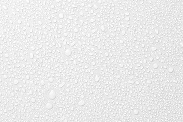 White surface with many water drops, closeup