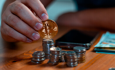 business man holding a coin cost support and saving money financial service concept and saving