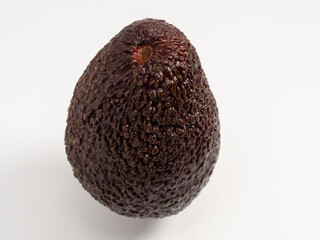 Ripe avocado on a white background. Fresh avocado.