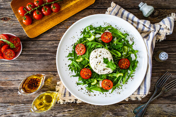 Mozzarella salad on wooden board

