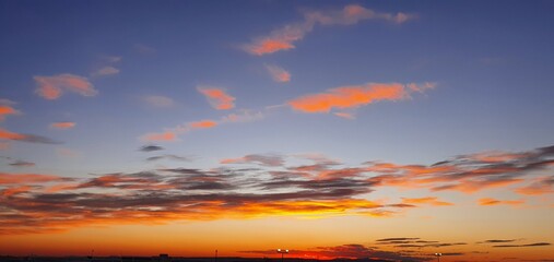 Naklejka na ściany i meble Bright sunset in Spain in winter. Orange sunset. Red sunset. Evening sunset in Spain. 