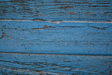 blue texture painted wood gray stripes covered white snow, background peeling old paint  texture,Abstract blue-grey background old painted wood fence texture of peeling paint closeup, snow wood paint