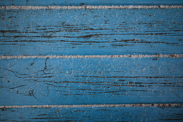 blue texture painted wood  gray stripes covered white snow, background peeling old paint  texture,Abstract blue-grey background old painted wood fence texture of peeling paint closeup, snow wood paint