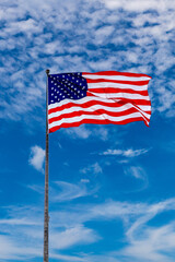 USA flag waving against sky