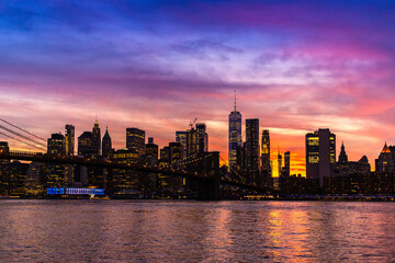 Obraz na płótnie Canvas Brooklyn Bridge and Manhattan at sunset