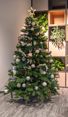 Portrait view of Christmas Tree in an Office enviroment