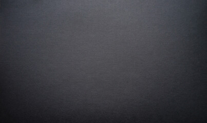 The background is black. Photo of the texture of black paper.A blank blank of dark color.