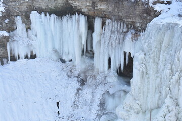 Fototapeta na wymiar Frozen Waterfall, Winter in Minnesota, Minnehaha Falls