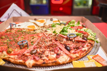 Gran pizza de 4 sabores huevo, jamon,ensalada,muzzareñña