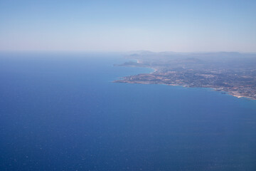 Fototapeta na wymiar Rhodes island view from airplane window, horizontal, top view.