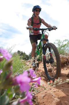 Woman rides the Templeton Trail in South Sedona, Arizona