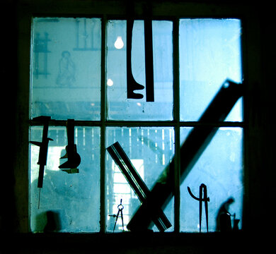 Window in an artist's metal forge in Spencer, West Virginia.