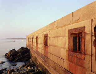 The outer wall of Fort Preble in South Portland, ME at sunrise