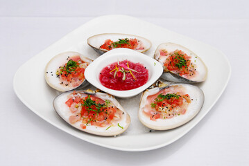 oysters, plate of oysters on the shell with fish ceviche and spicy red onion, food