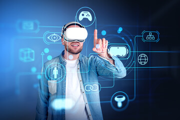 Young man in vr glasses, virtual reality hologram with diverse digital icons