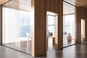 Office interior with pc computer on desk, panoramic window on city view